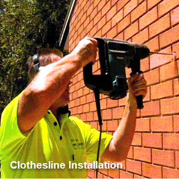 Clothesline Installer in Melbourne drilling hole in the wall