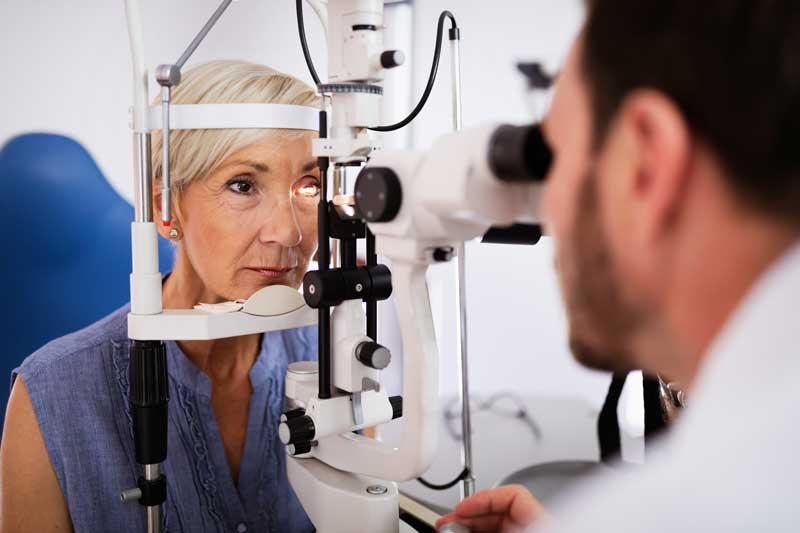 women getting her eyes checked