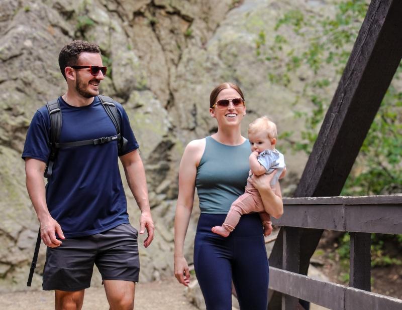 Family enjoying a mountain hike together.