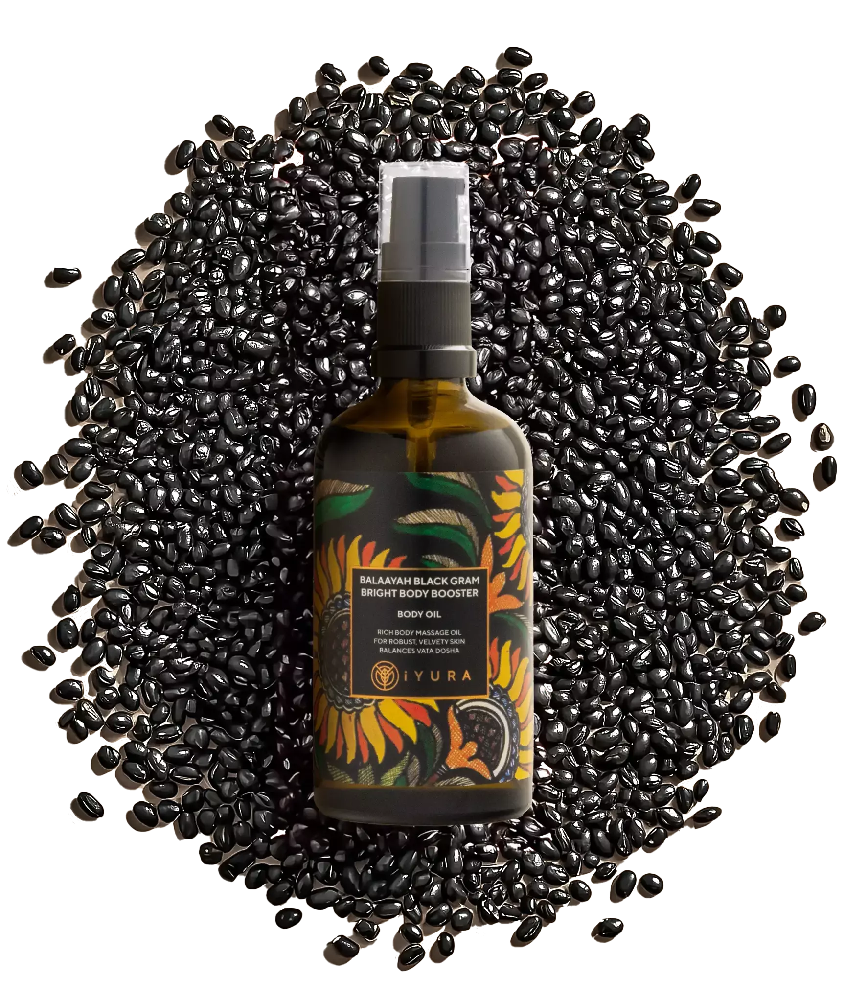 A bottle of Balaayah surrounded by black-grams
