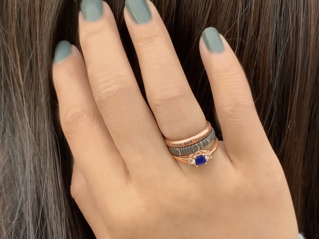 You may want to consider multiple wedding bands as a design choice