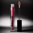 Plumping Lip Gloss - Pink Pout vial standing next to applicator with shadows in background