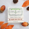 Picture of a box of Pumpkin Spice Shart Wash Soap on a white background with acorns and orange leaves
