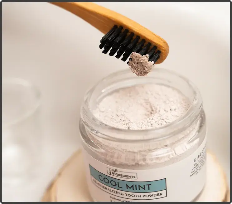 Dip into the tooth powder