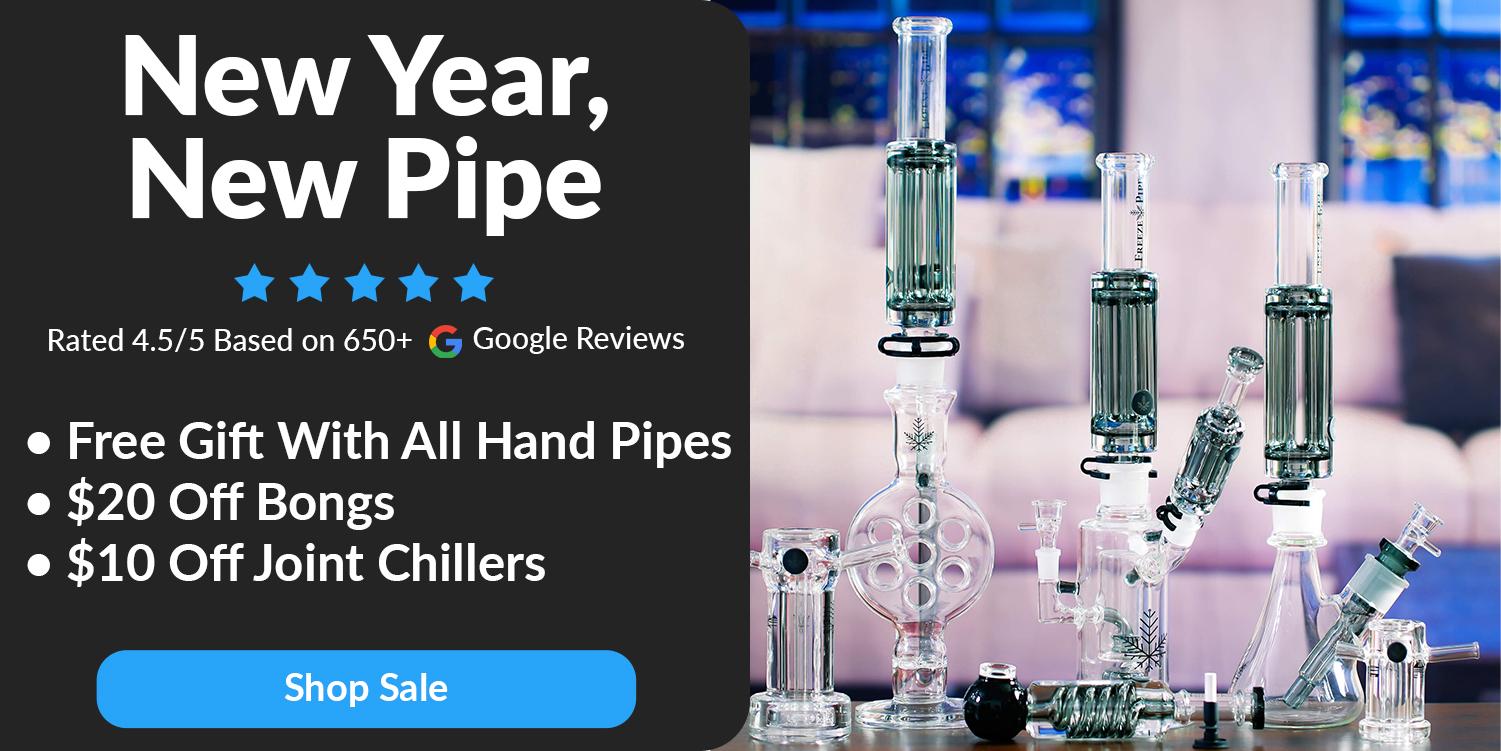 glass bongs on table in front of couch