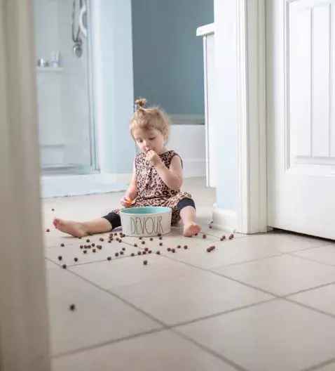 baby eating cat food