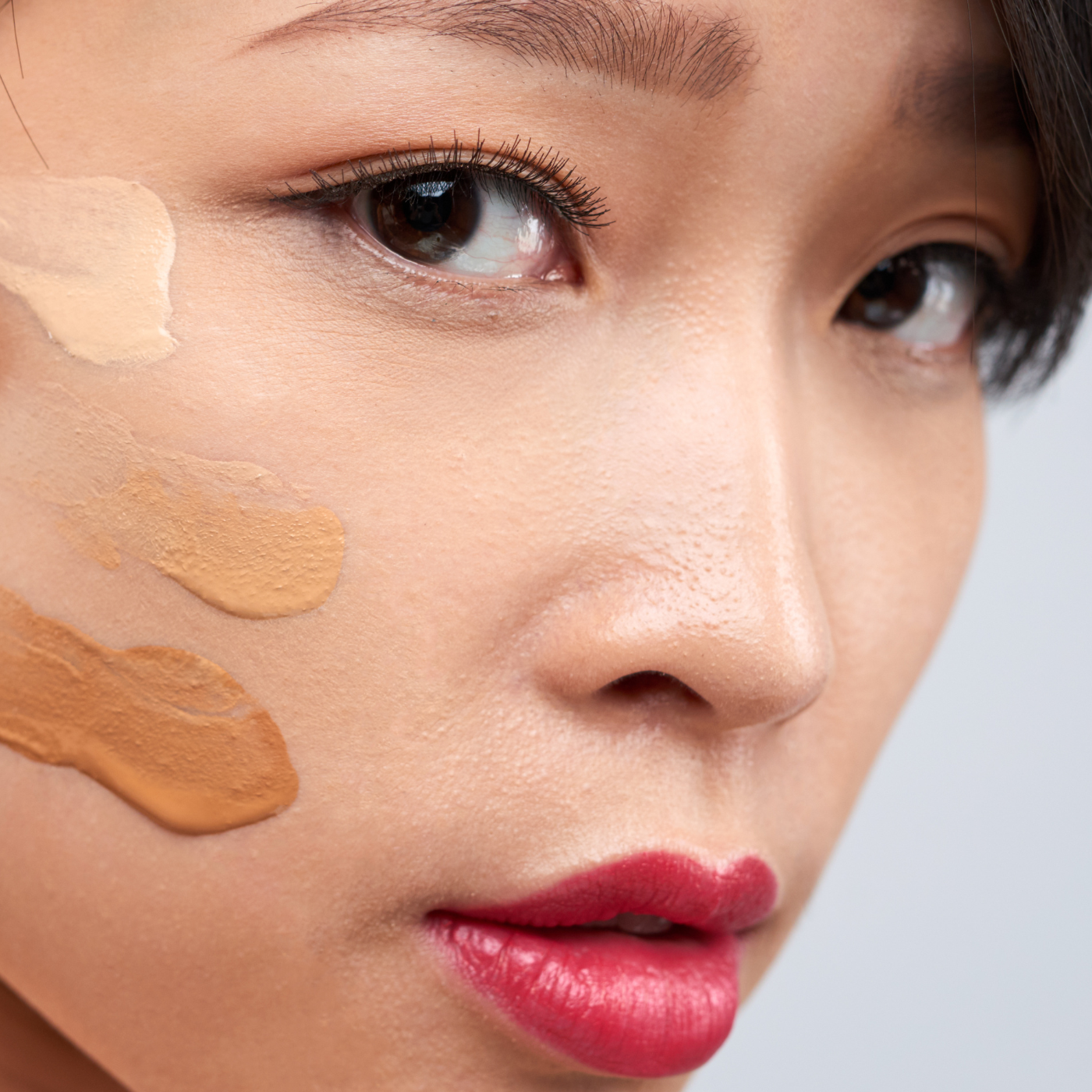 Asian Woman Showing Foundation Colors