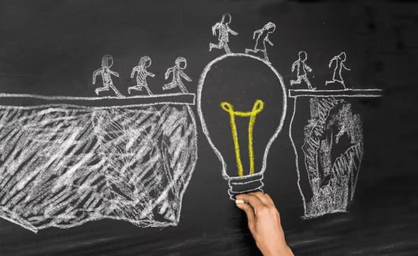 People Walking Across Light Bulb Chalk