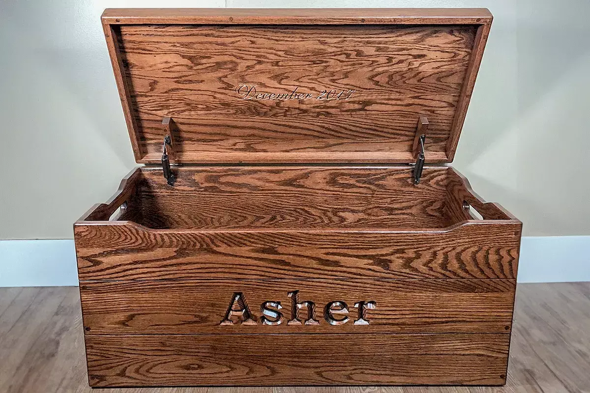 Name with engraved chest and inner lid