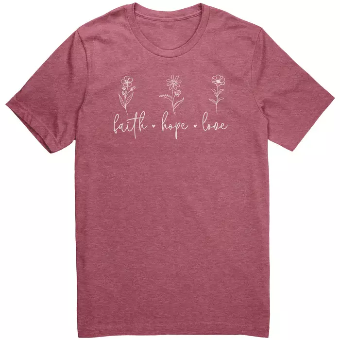 maroon tee with three flowers, under each flower the text in cursive says " faith, hope love"