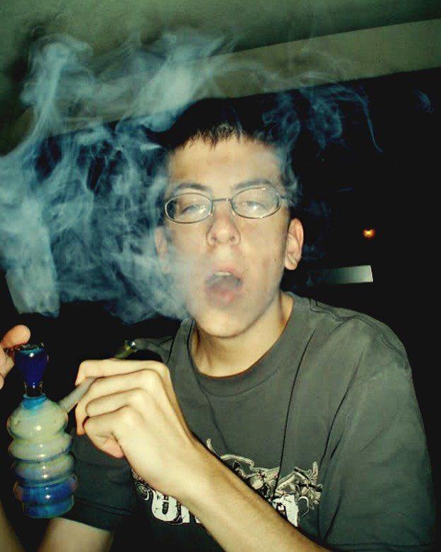 Character McLovin from the movie Superbad taking a very large inhale, symbolizing taking a deep, comfortable draw or hit enabled by ice-cooled smoke.