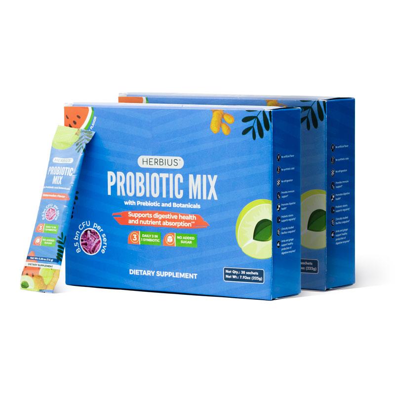 Two boxes of Herbius Probiotic Mix dietary supplement with one sachet leaning against it.