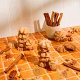 churro cookies in towers with pecans and cinnamon sticks