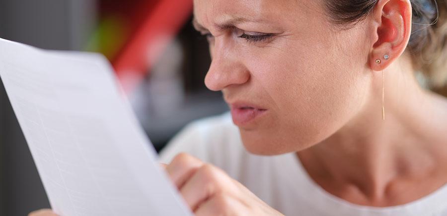 Woman unable to read fine prints