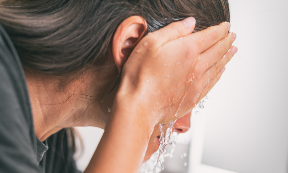 Woman Washing her face