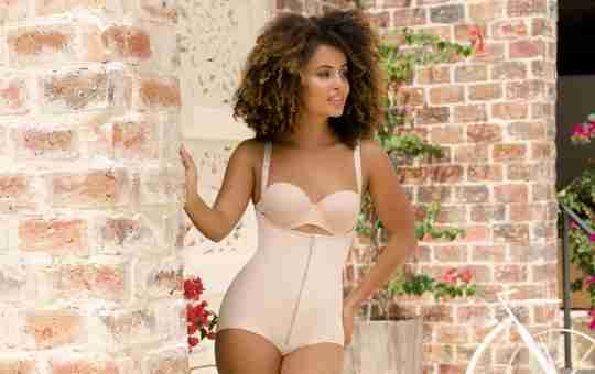 model wearing loungewear compressiom, best slimming body shaper for women in color nude to wear at home