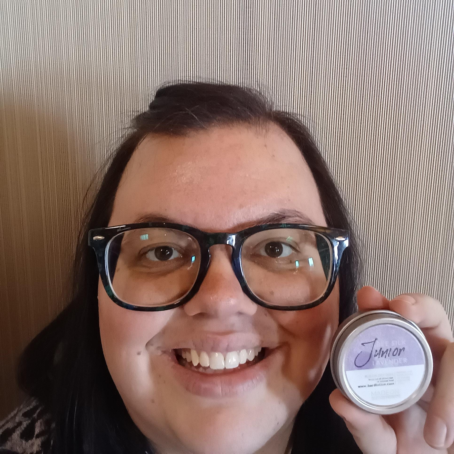 woman holding lavender beesilk jr