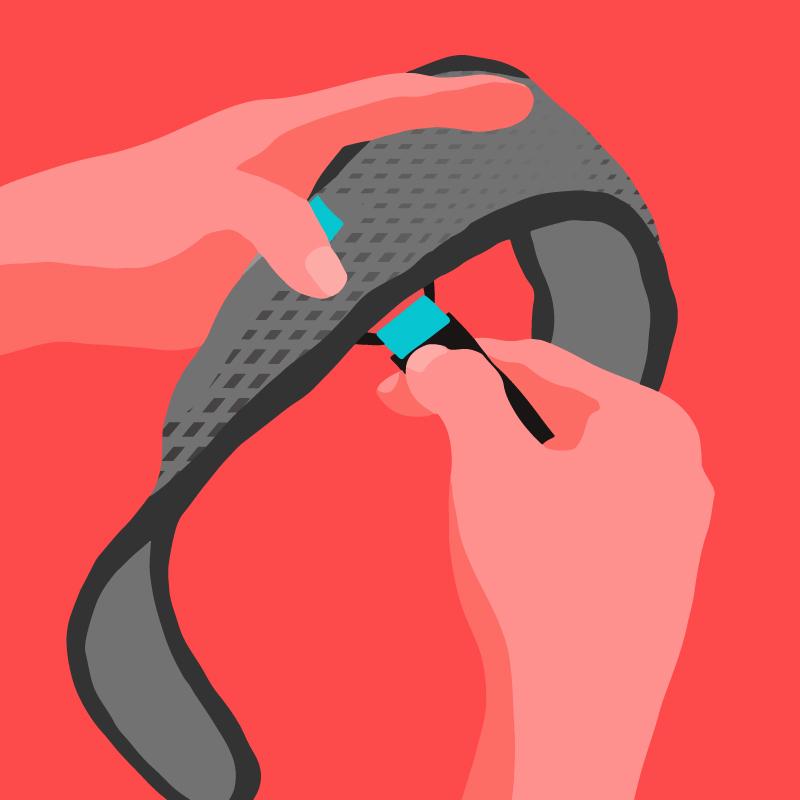 Close-up image of a hand attaching one end of the over-head strap to a loop on the sleep mask with headphones.