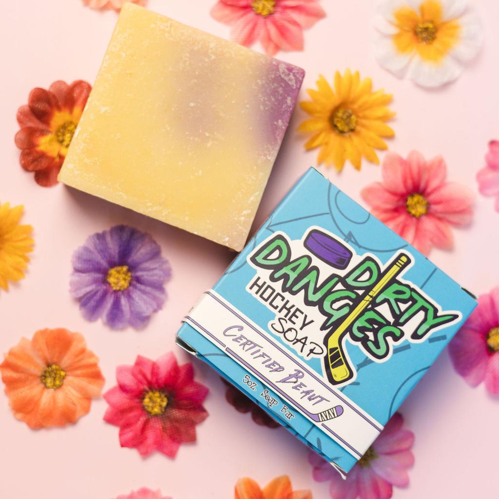 a box of certified beaut hockey soap on a flowery background.