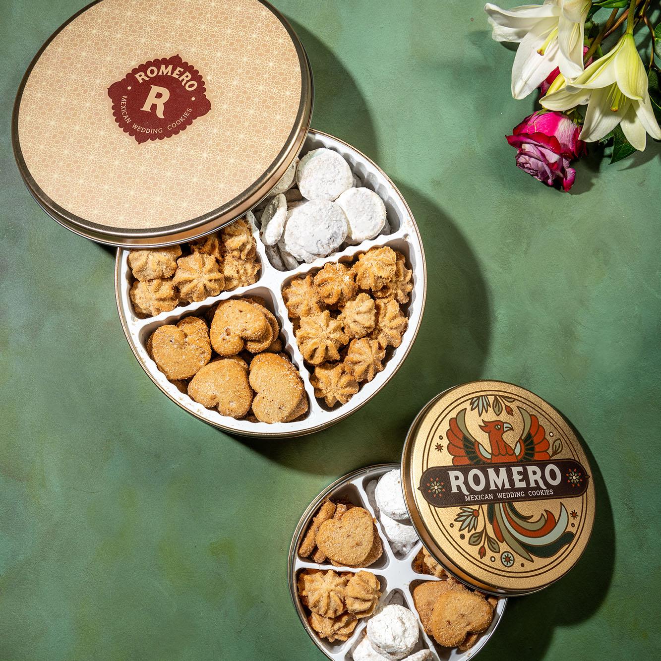 cookie tins on green background with flowers