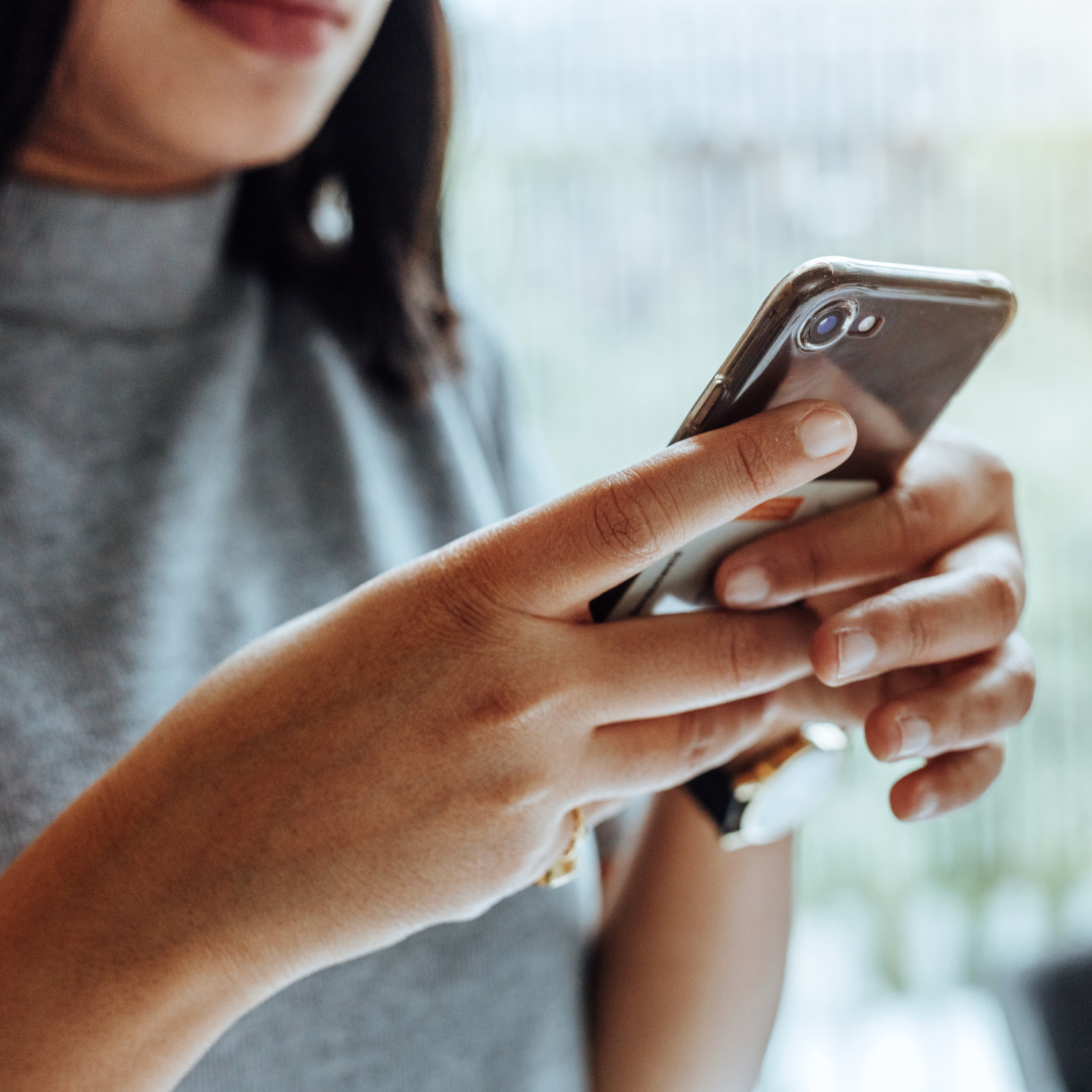 woman using mobile phone