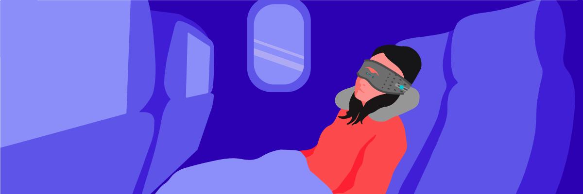 A sleeping woman sitting on the window seat, using a travel pillow and a Bluetooth sleep mask with headphones, to fall asleep on a plane fast.