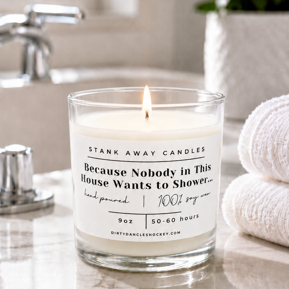 A white scented hockey candle in a bathroom. Because nobody in this house wants to shower...