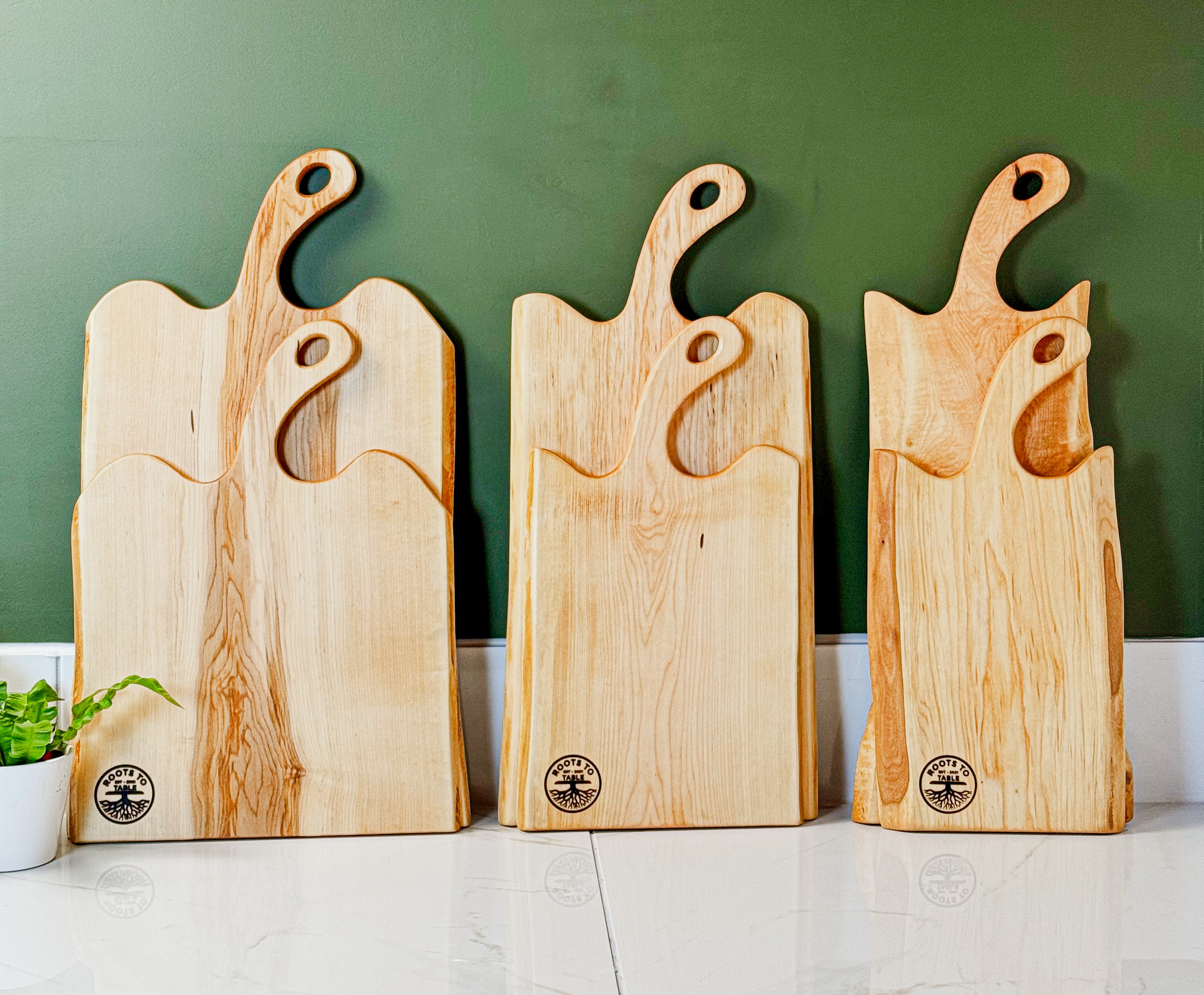 The different canopy series live edge charcuterie boards available