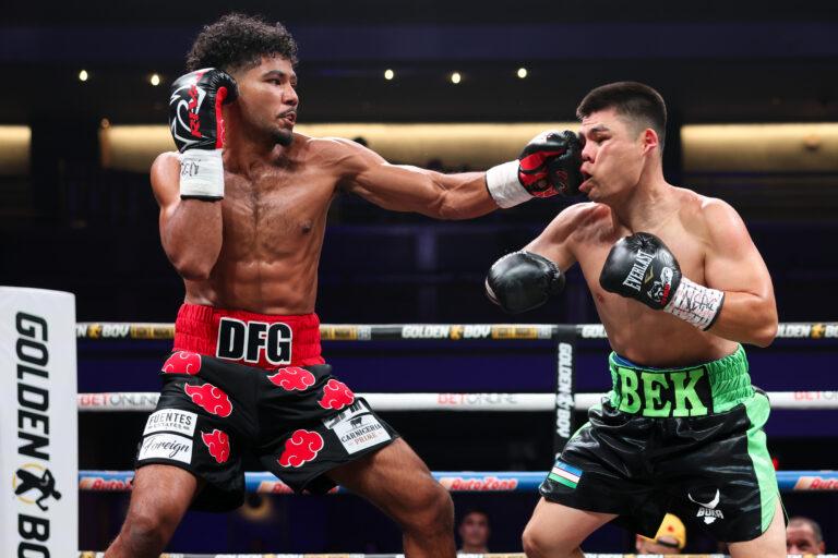 Darius Fulghum landing a punch on an opponent during a boxing match