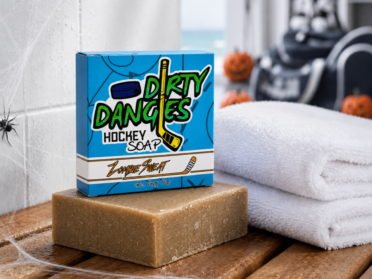 zombie sweat pumpkin spice scented hockey soap bar in a locker room with a towel, hockey gear and halloween decor