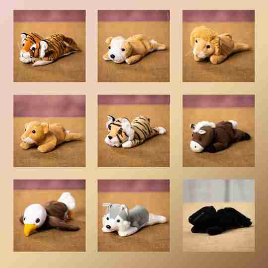 An assortment of laying plush animals