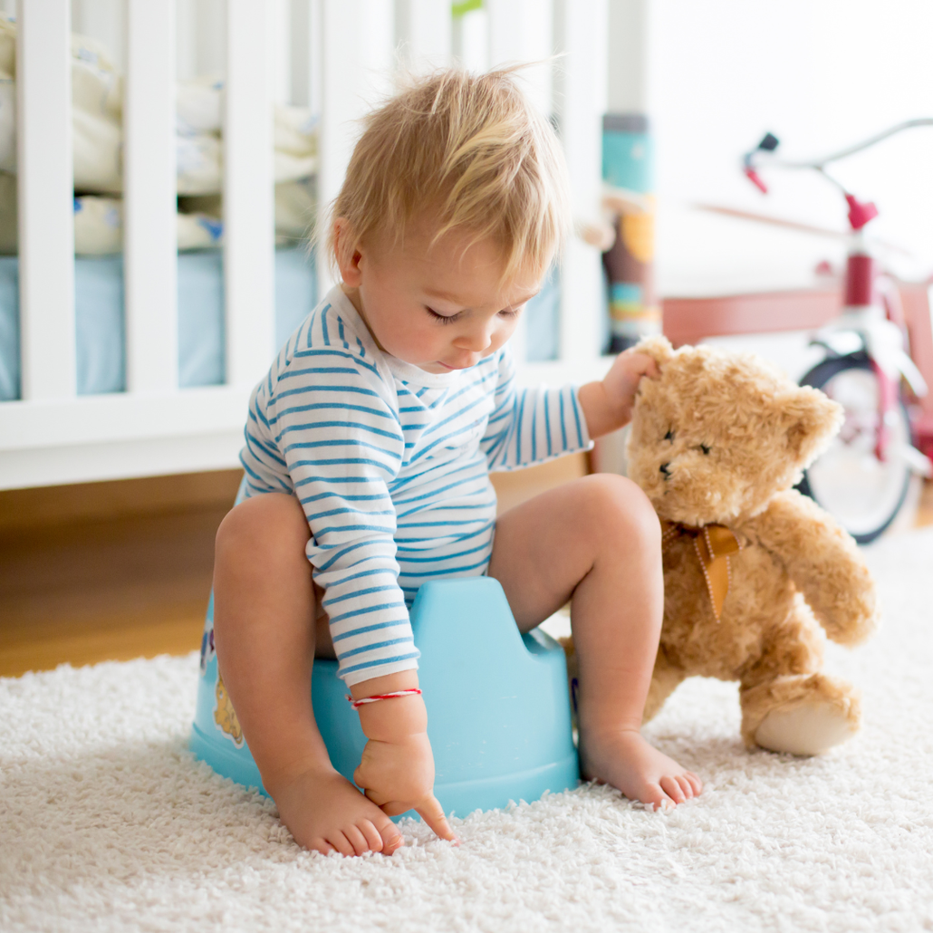 Boy sitting on PeapodMat