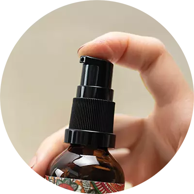 Taking a pump of serum using the bottle