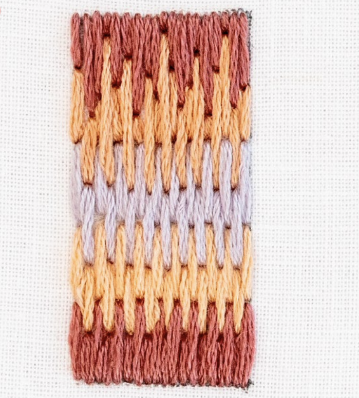 This is an image of step 5 of long and short stitch.