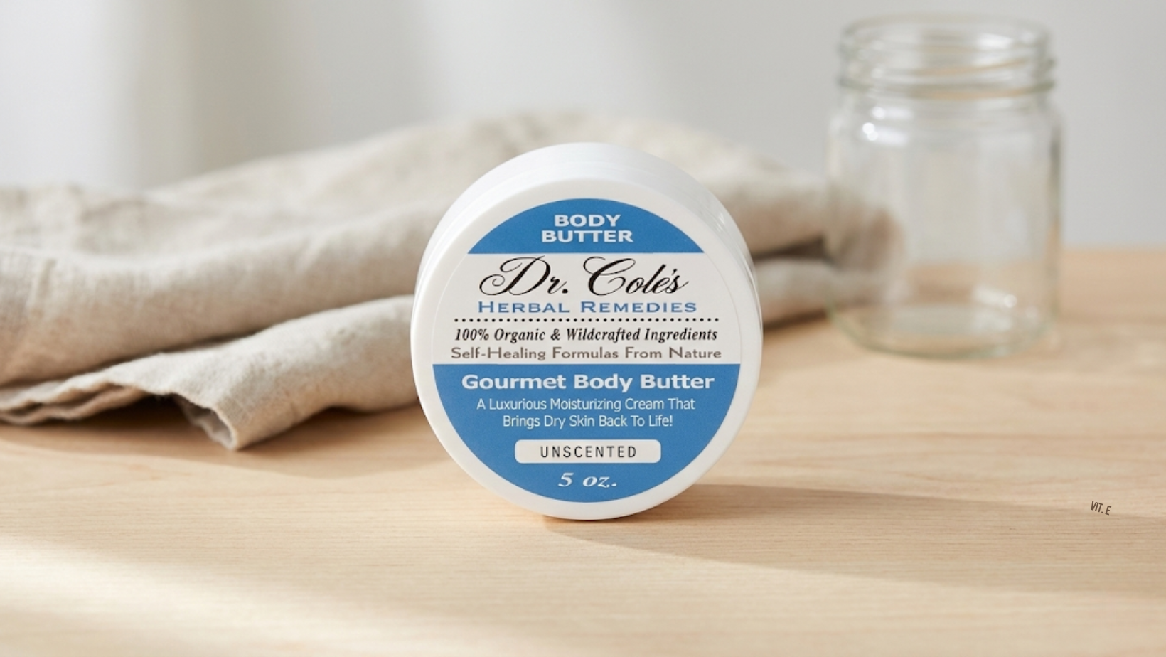 Dr. Cole’s Gourmet Body Butter in a clean, natural light setting