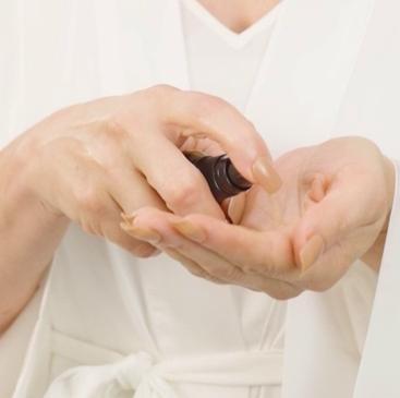 taking serum in hands
