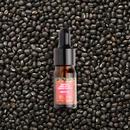 A bottle of Yauvari amplified youth spring kept in front of a black gram background
