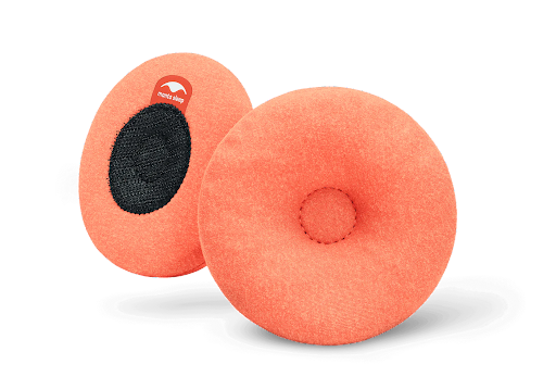 Orange steam eye cups with circular indentations for a sleep mask are some of the best sleep products out there.