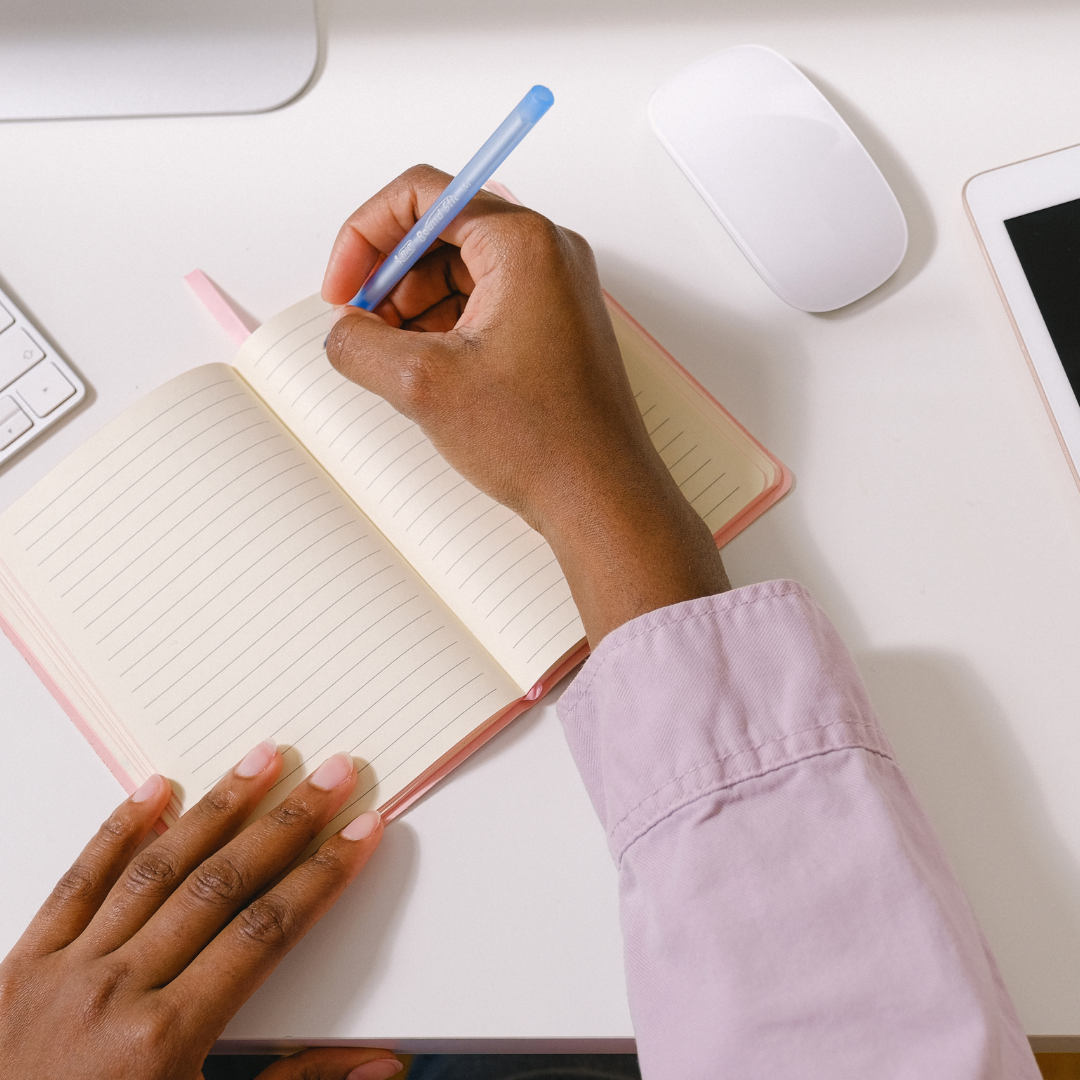 Woman taking notes