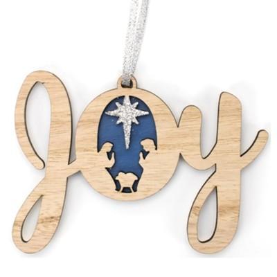 the word joy in wood with a nativity scene in the letter o