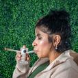 woman smoking a joint and blunt bubbler