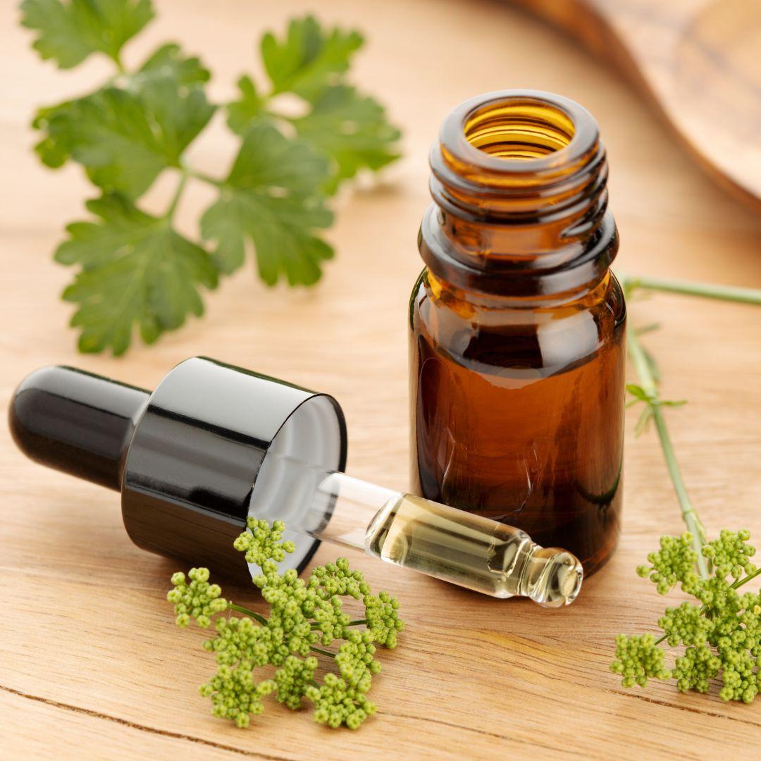 Essential oil with fresh herbs