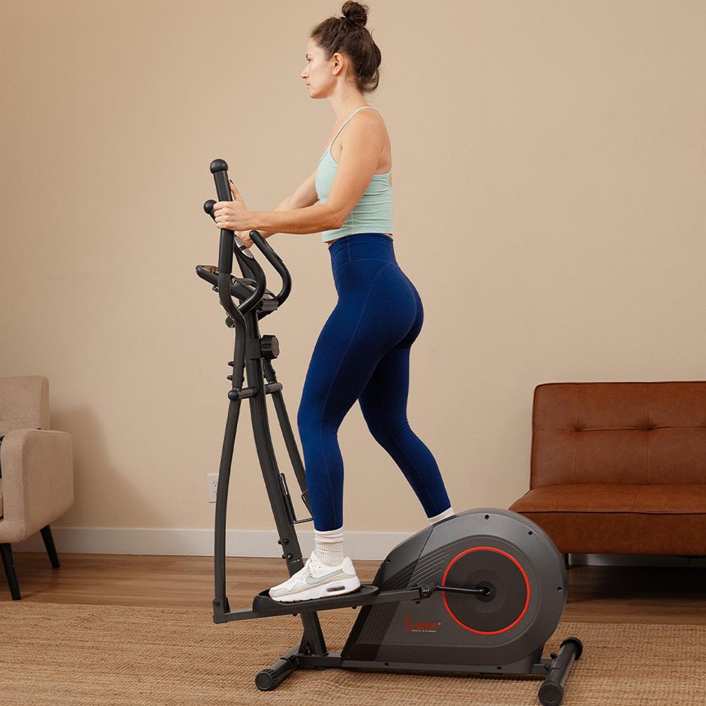 woman exercising on an elliptical