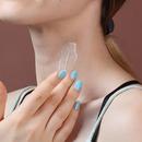 A woman applying Cerabuild on her neck