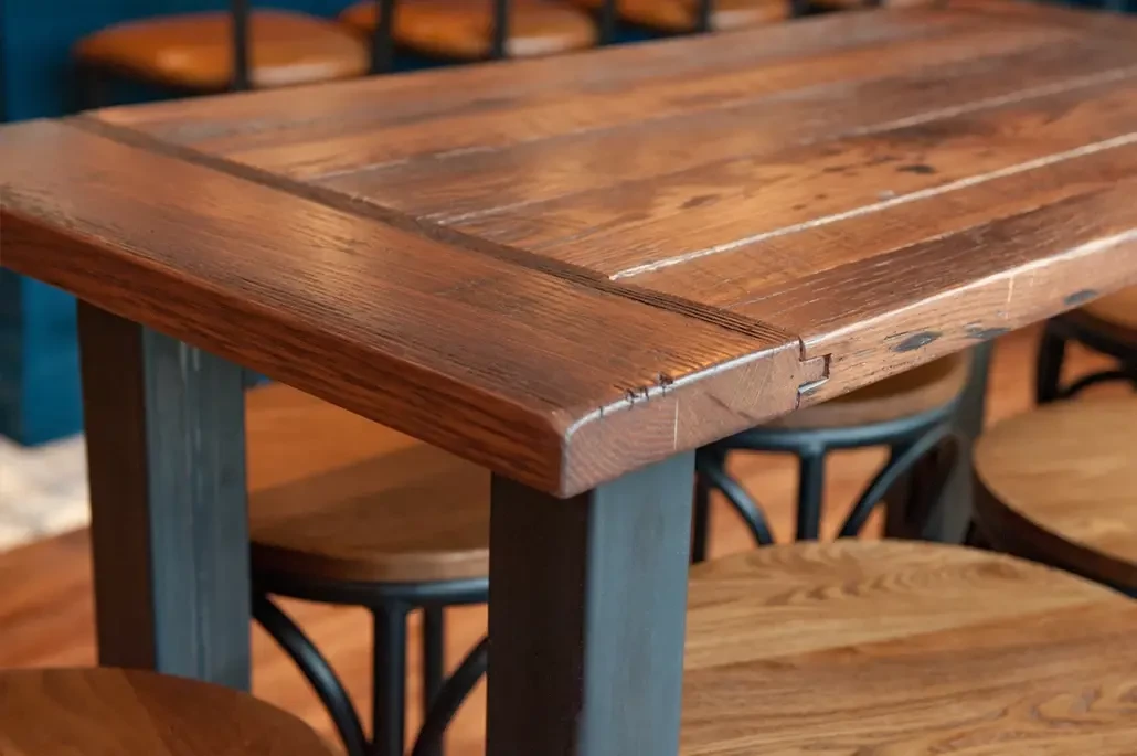 close up reclaimed barnwood table