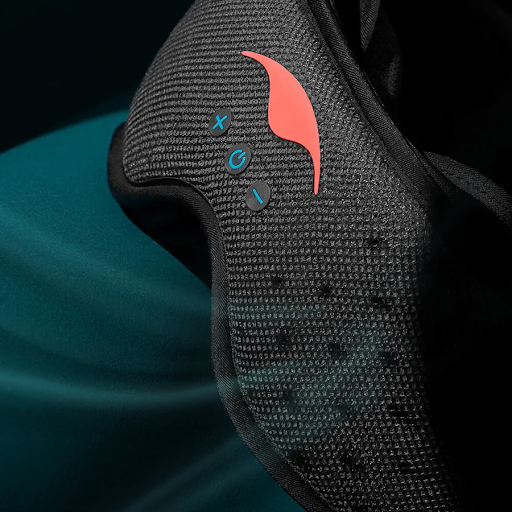 The front of sleep mask with headphones made from mesh and perforated foam with volume controls under an orange Manta Sleep logo.