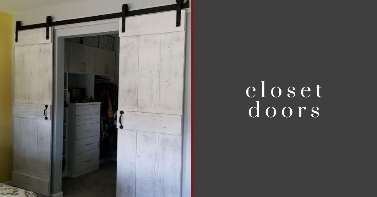 Distressed white barn doors closet