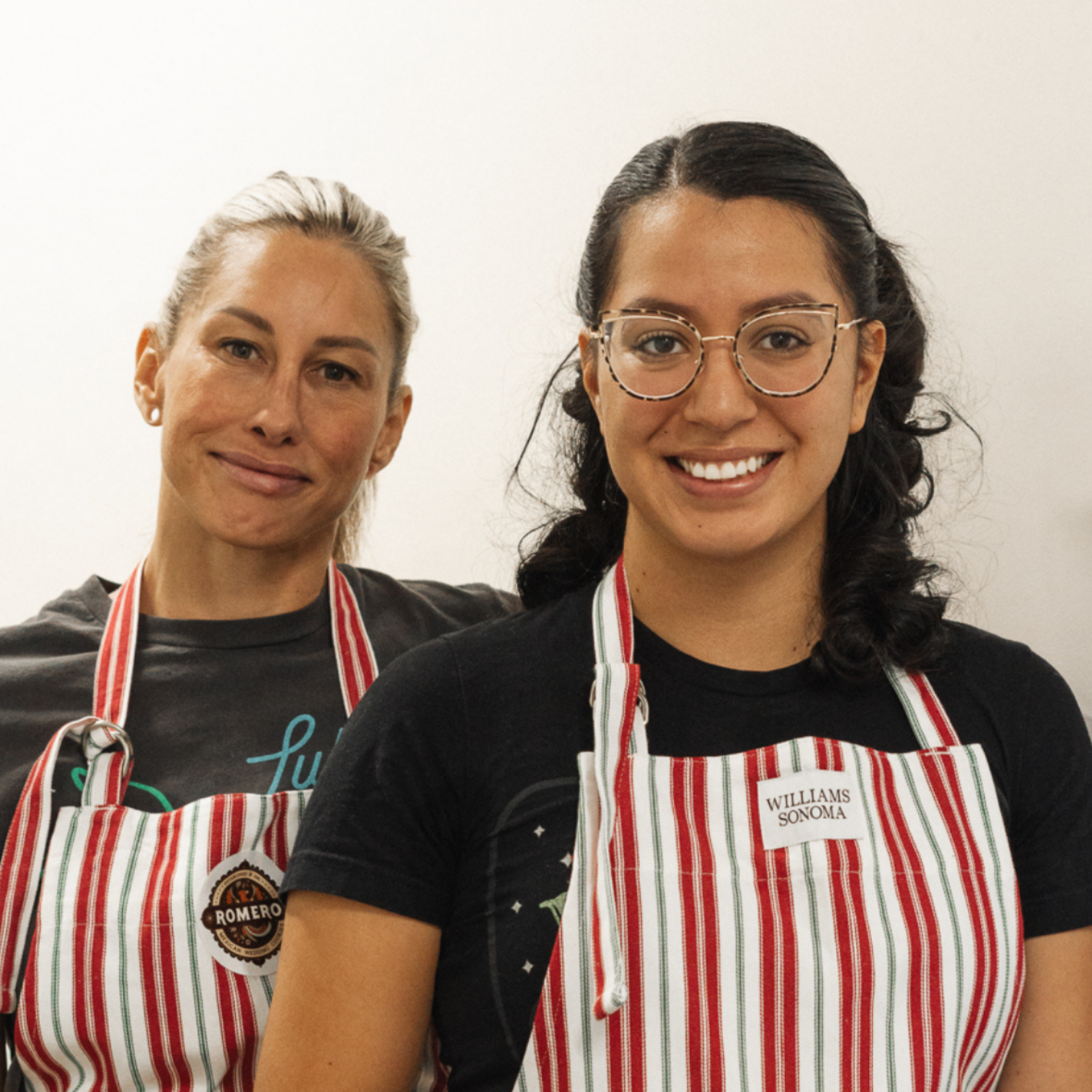 two employees at a bakery