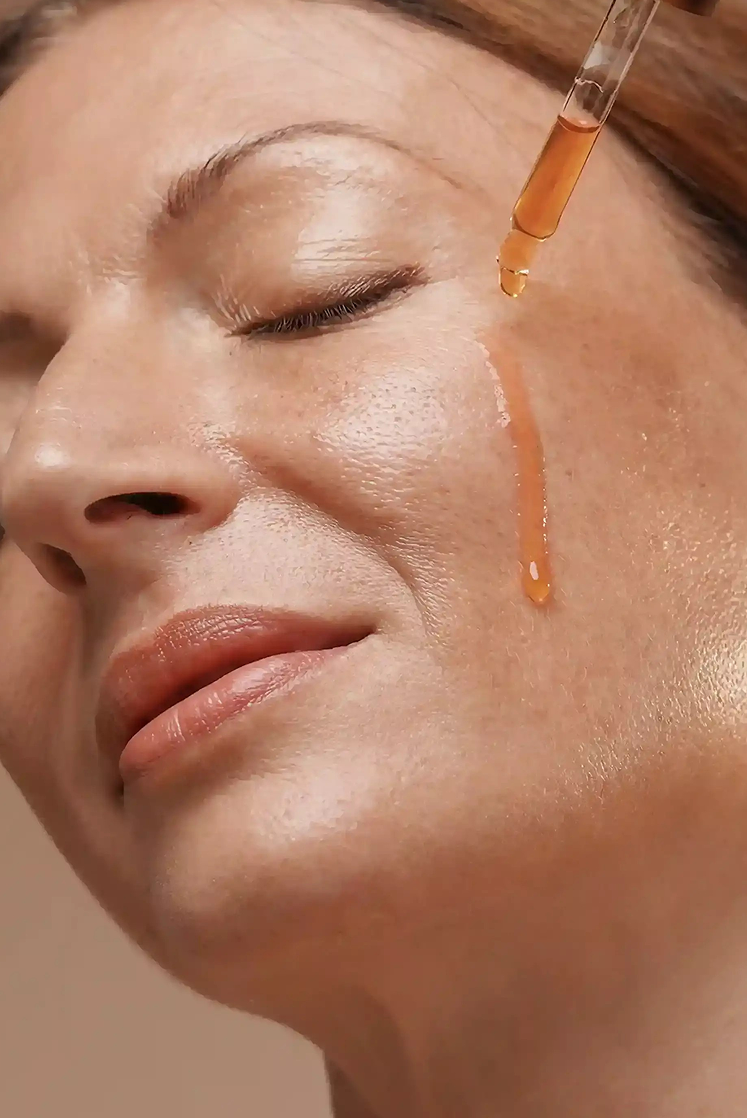 While skin is still slightly damp, take 3 drops of Kesaradi in your palm