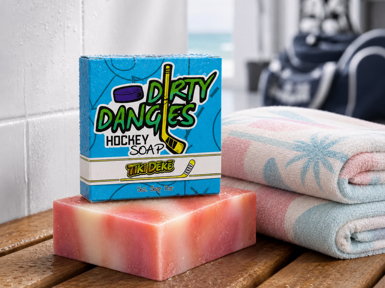 a bar of tiki deke tropical coconut girls hockey soap inside a clean hockey locker room with a pink white and blue beach towel.
